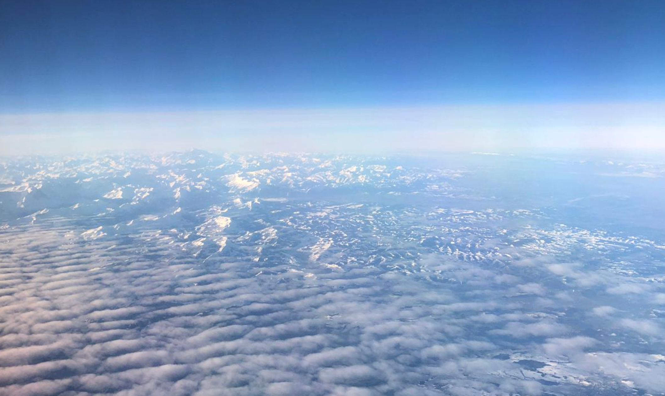 De Alpen in zicht, sneeuw to ver in Duitsland